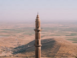 a tall tower with a clock on top of it