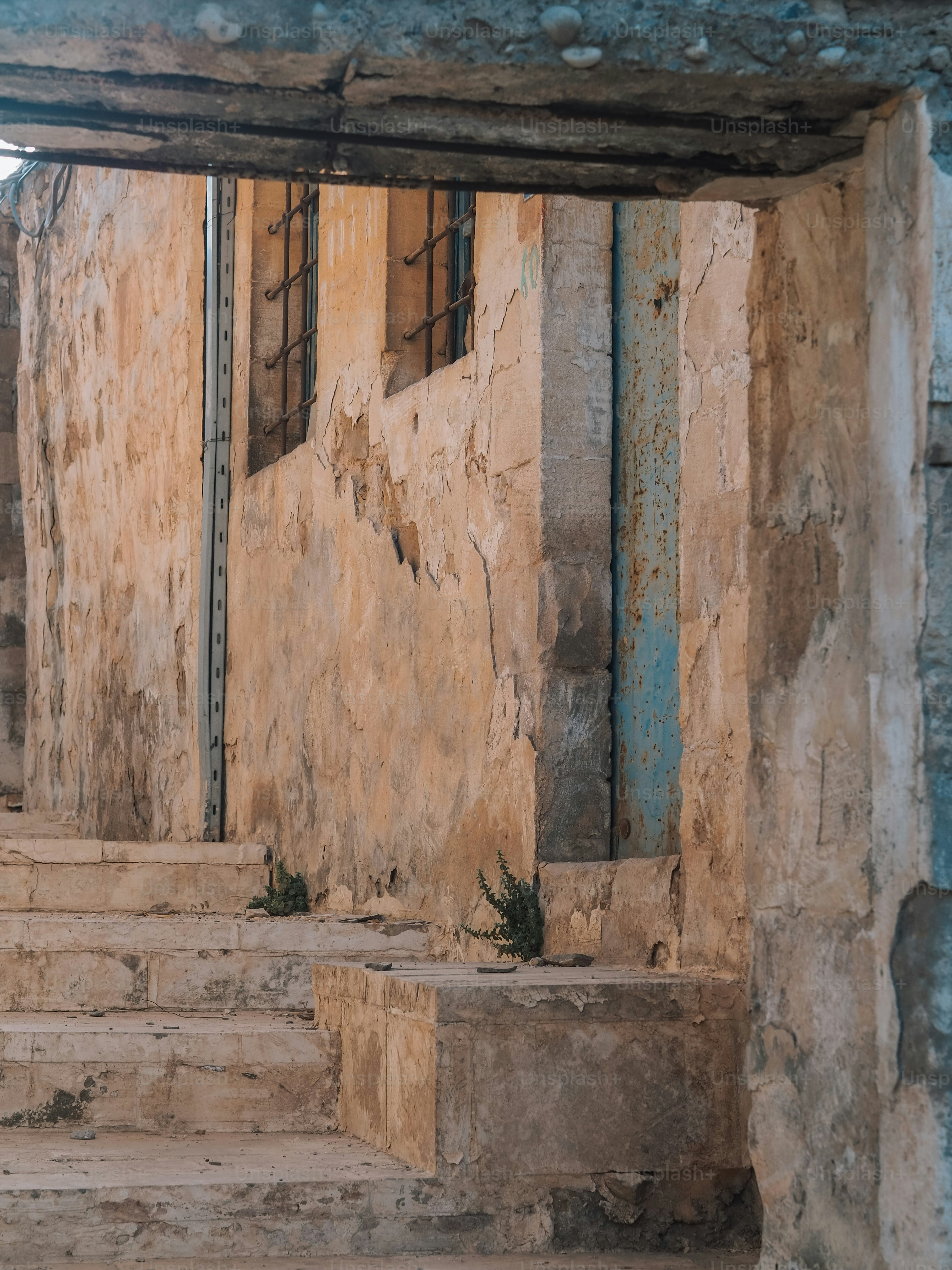 a stone building with steps leading up to it