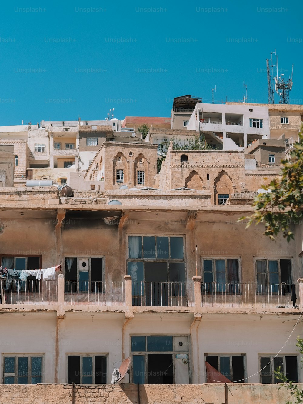 a tall building with balconies and balconies on top of it