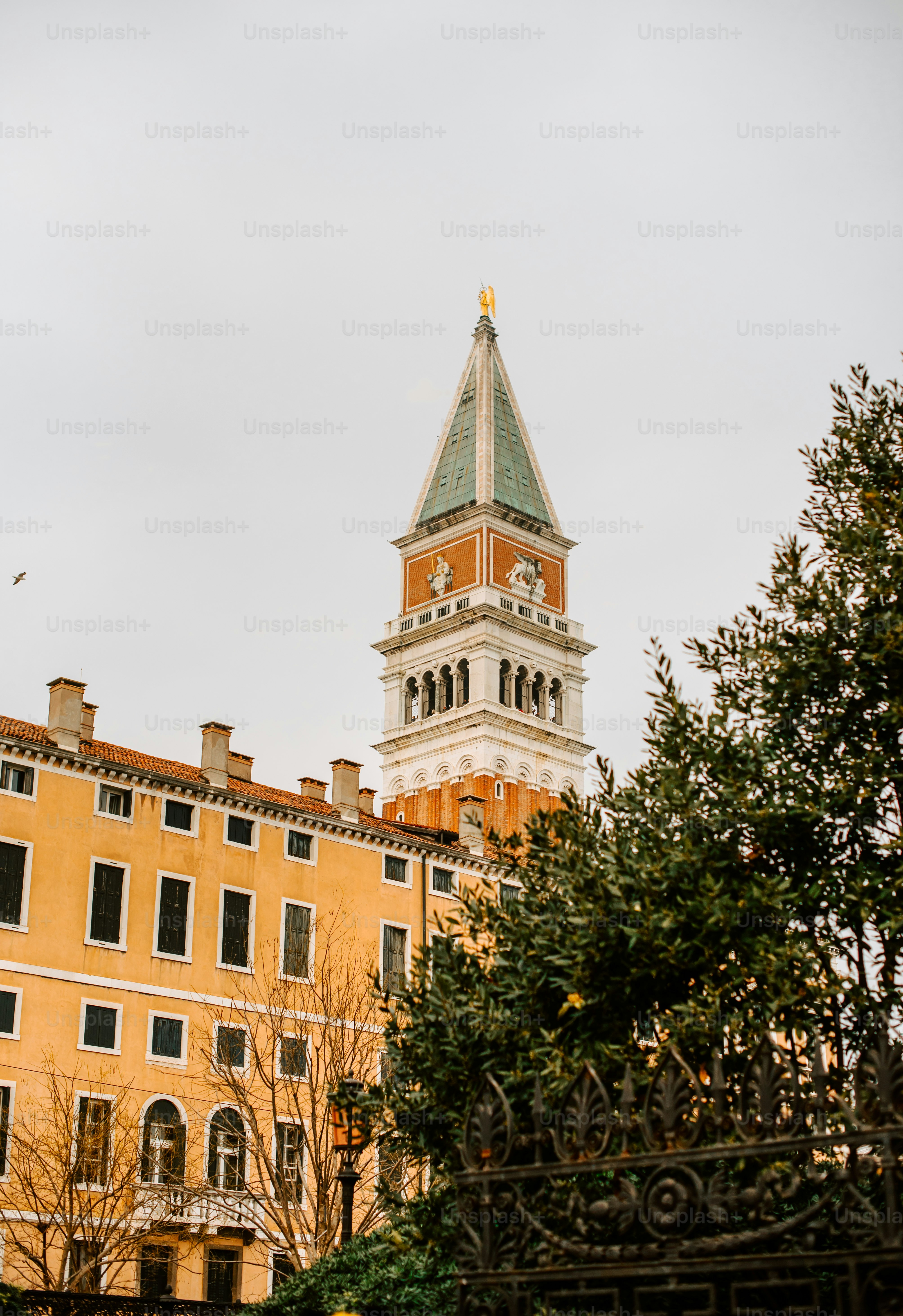 a tall clock tower towering over a city
