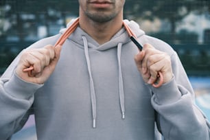 a man holding a pair of scissors in his hands