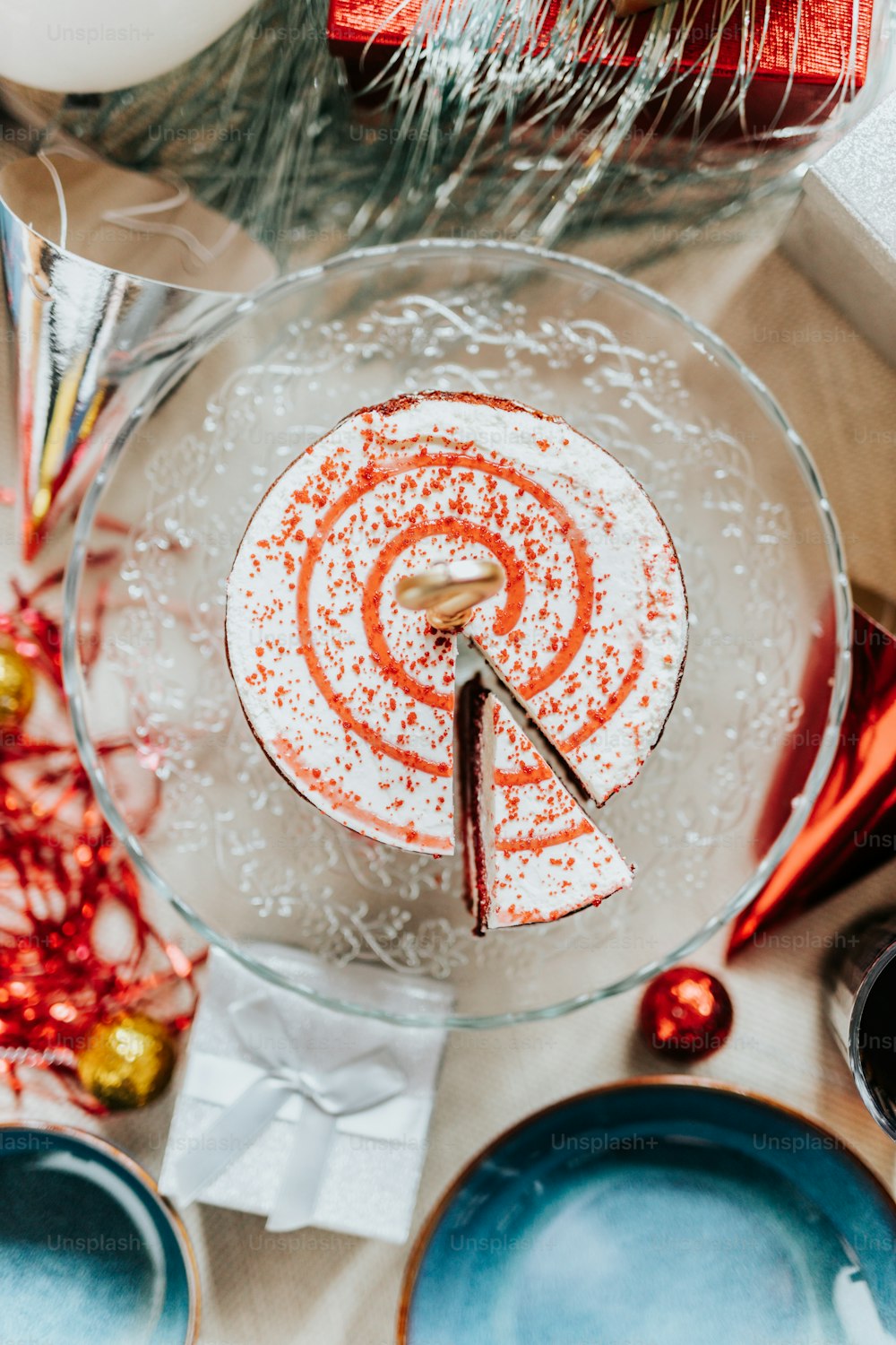 a glass plate with a candy cane on top of it