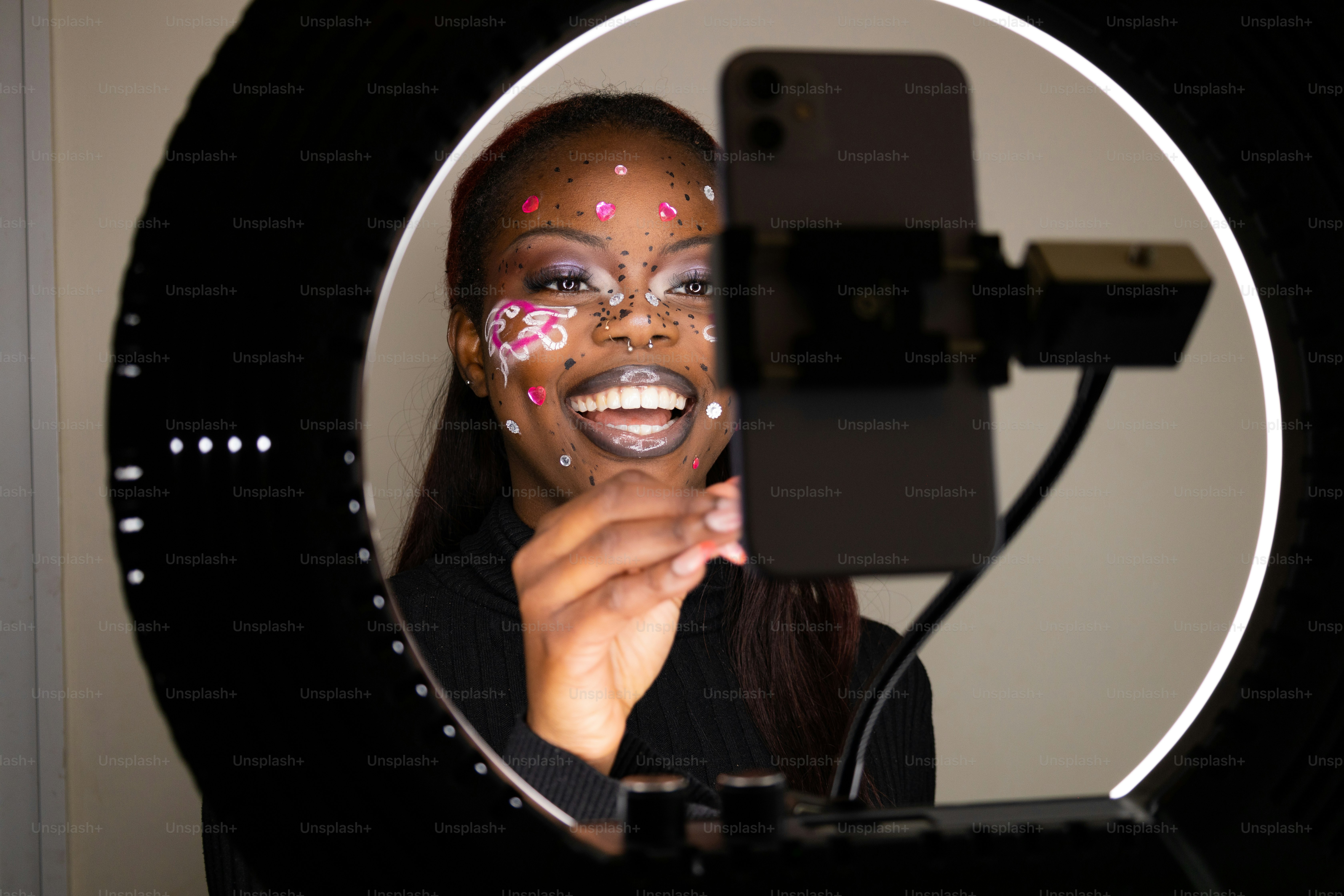 a woman taking a picture of herself in a mirror