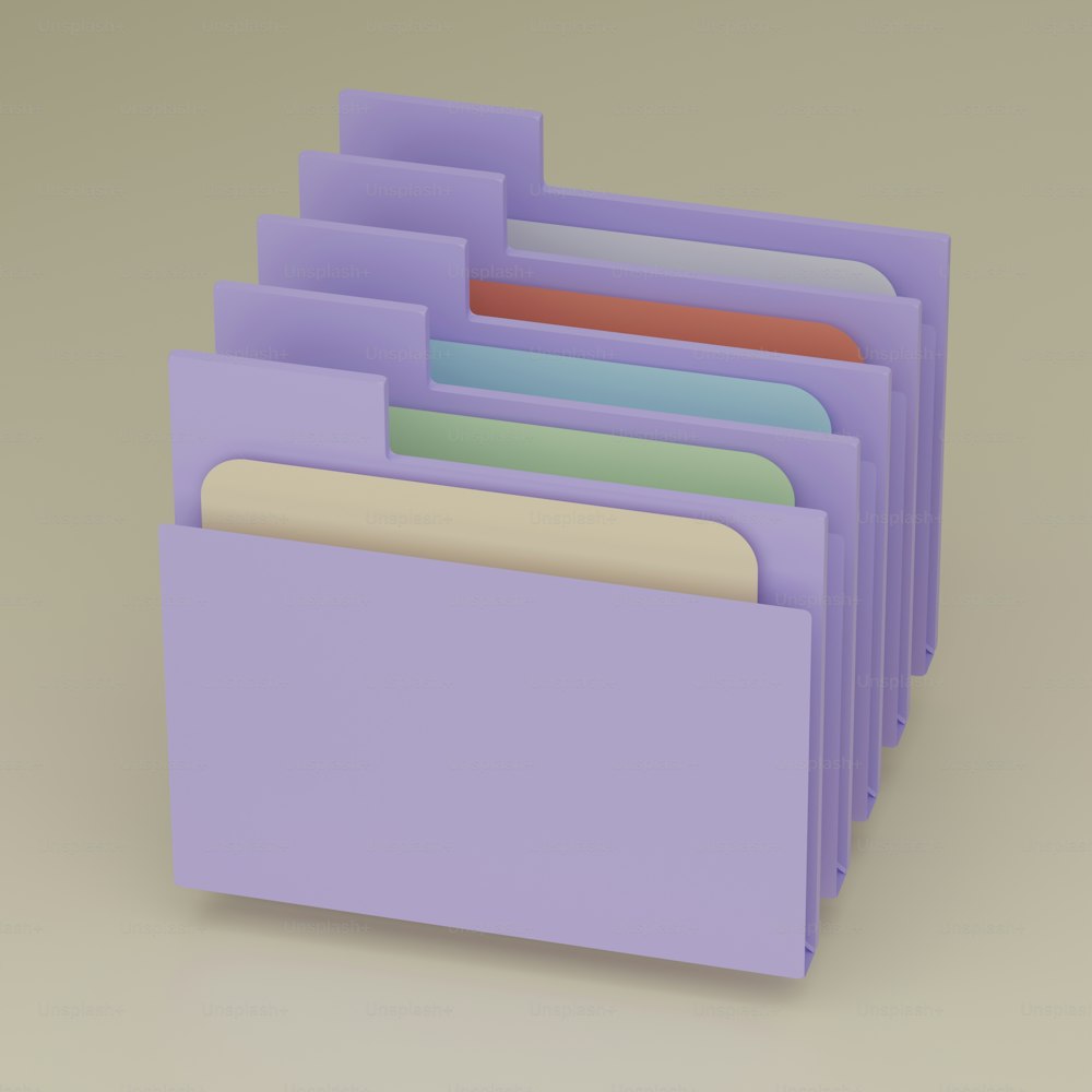 a pile of folders stacked on top of each other