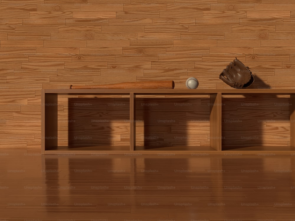 a baseball bat, glove, and ball on a shelf