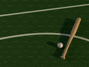 a baseball bat and a ball on a field