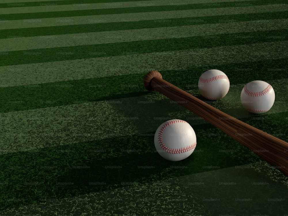 tres pelotas de béisbol y un bate en un campo de béisbol