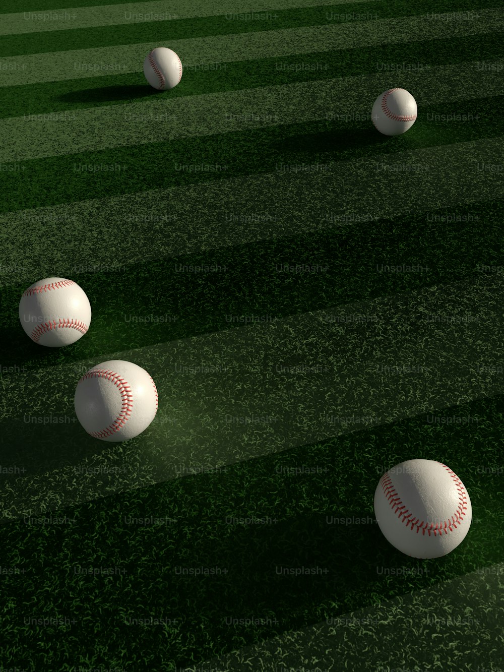 a group of baseballs sitting on top of a field