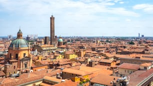 a view of a city with tall buildings and a clock tower