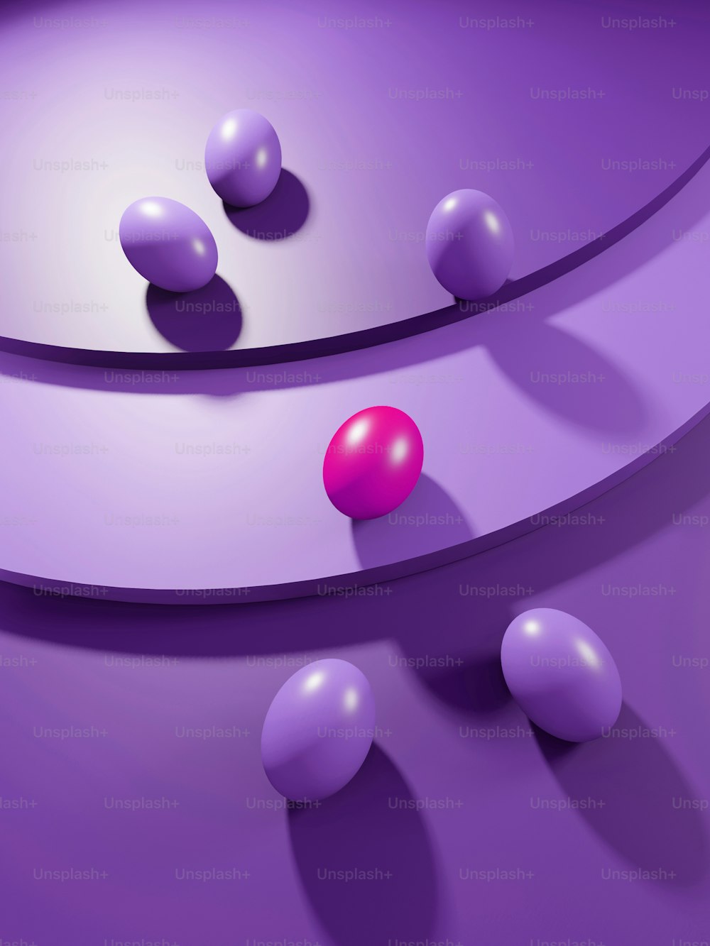 a bunch of balls on a purple surface