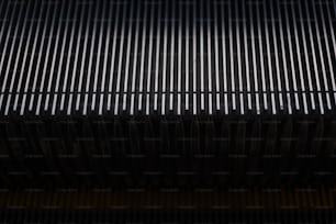 a close up of a metal grill grilling