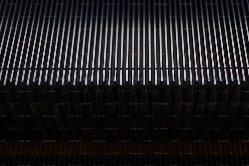 a close up of a metal grill grilling