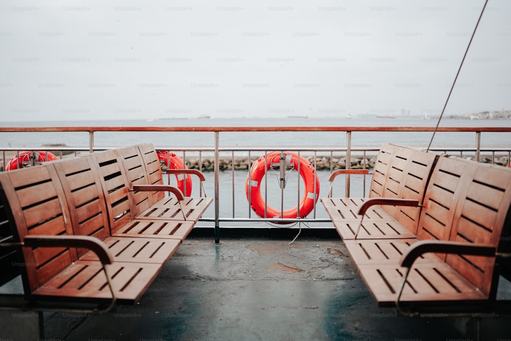 a couple of wooden benches sitting next to each other