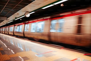 a train speeding by in a train station