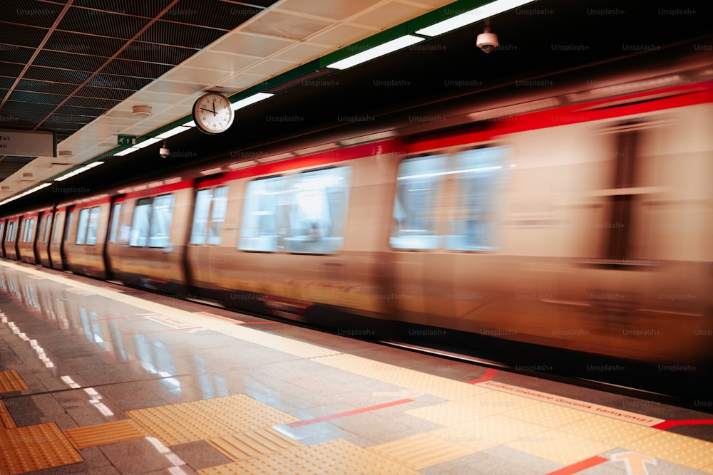 a train speeding by in a train station