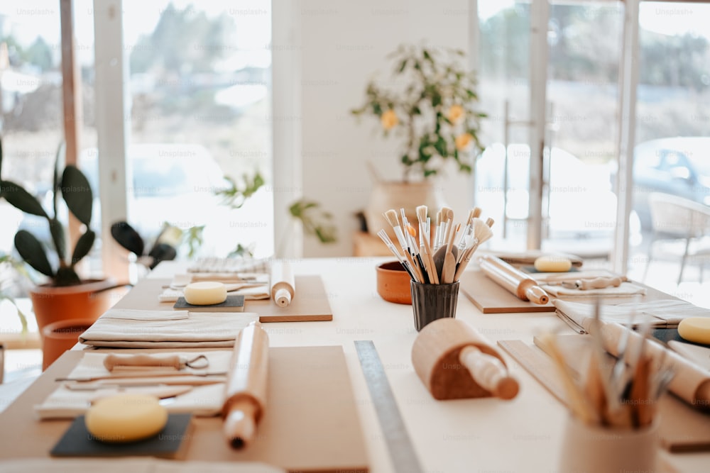 a table with a lot of crafting supplies on it