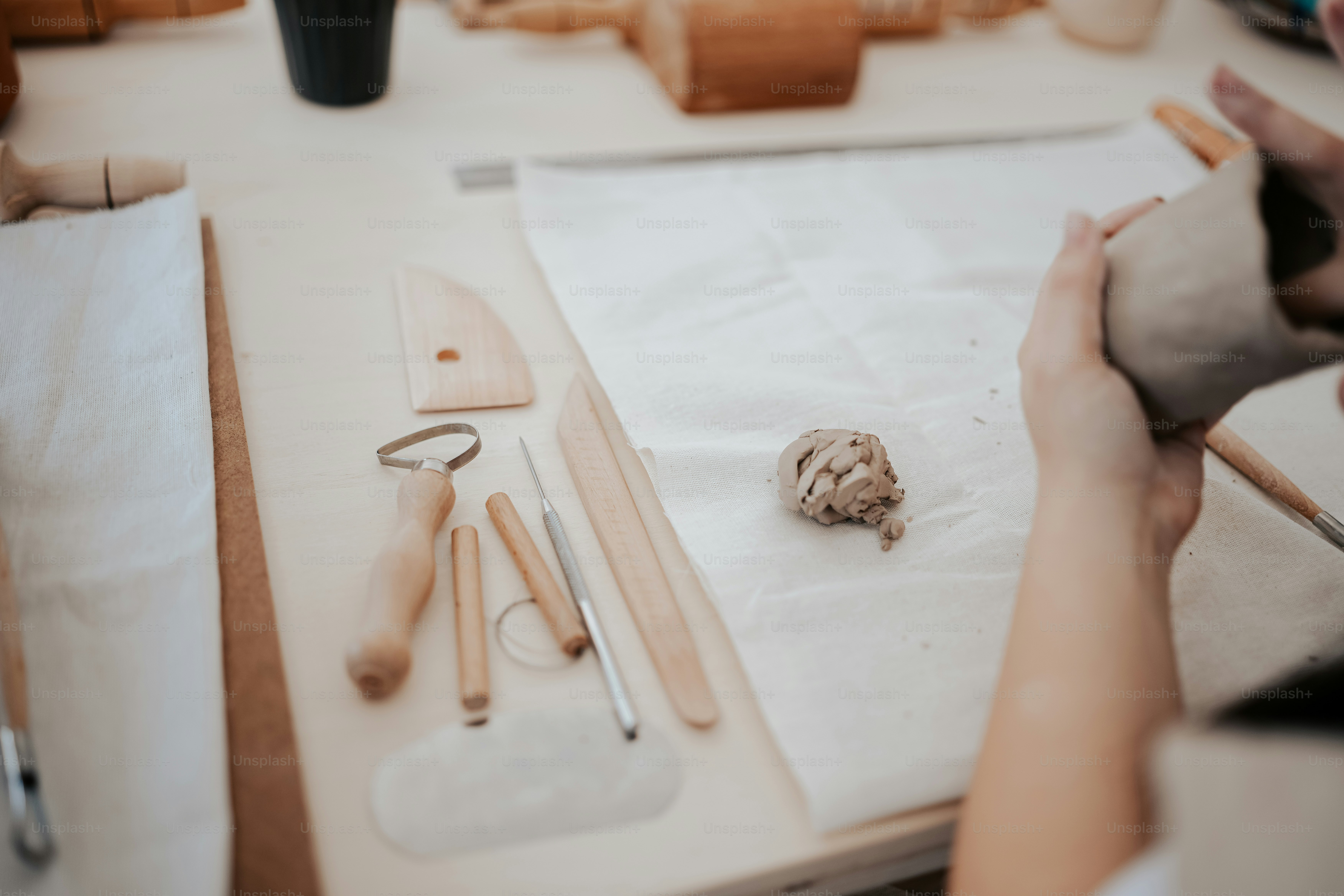 A person is working on a craft project photo – Workshop Image on Unsplash