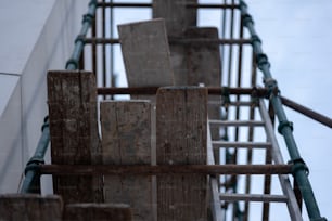 a close up of a wooden structure with a sky background