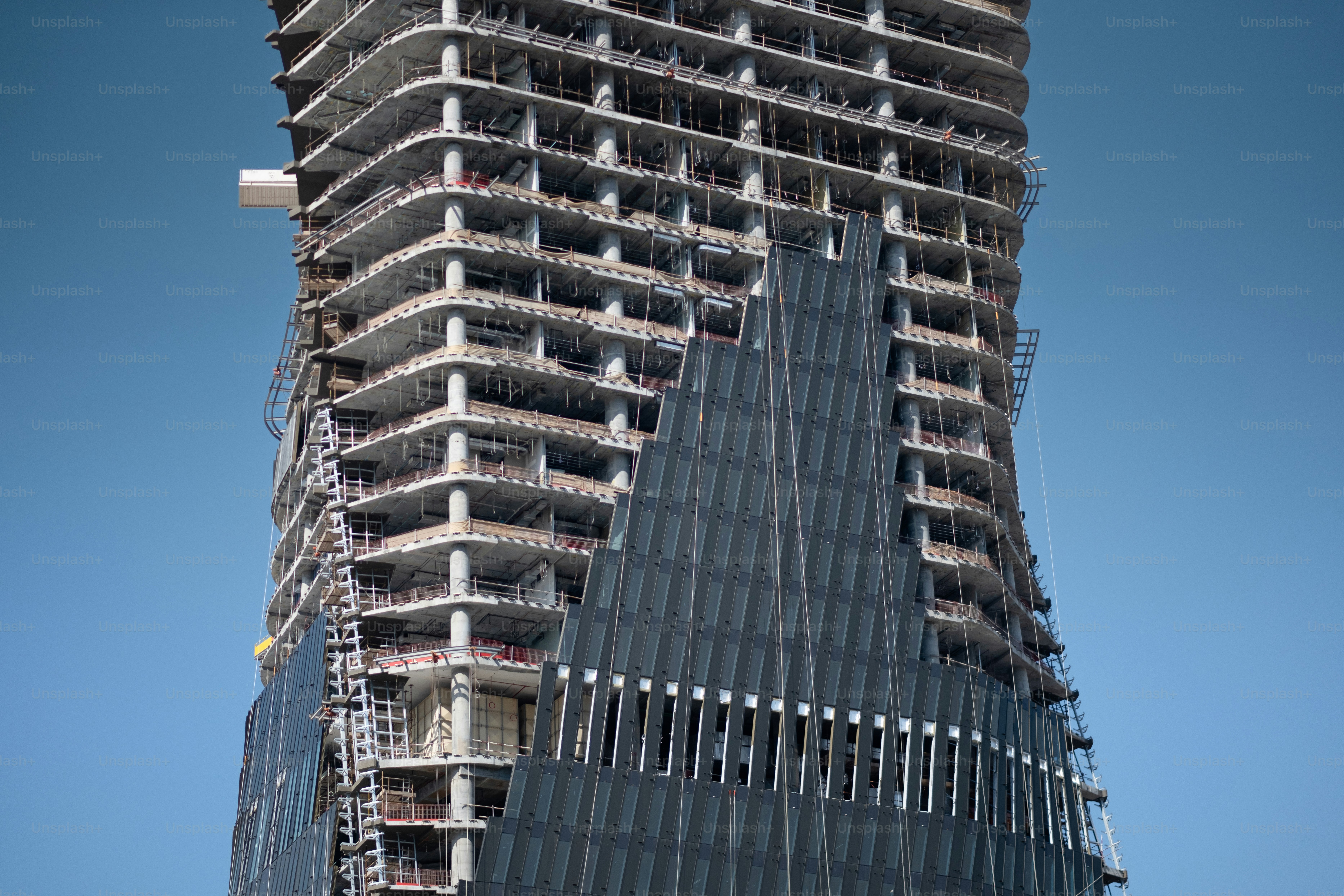 a very tall building with a clock on it's side