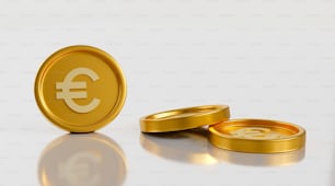 deux bagues en or avec un symbole monétaire