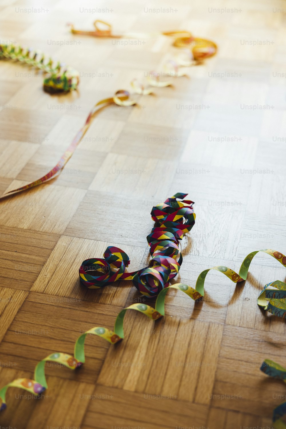 colorful streamers of streamers on a wooden floor