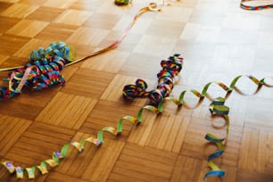 a group of ribbons on a wooden floor