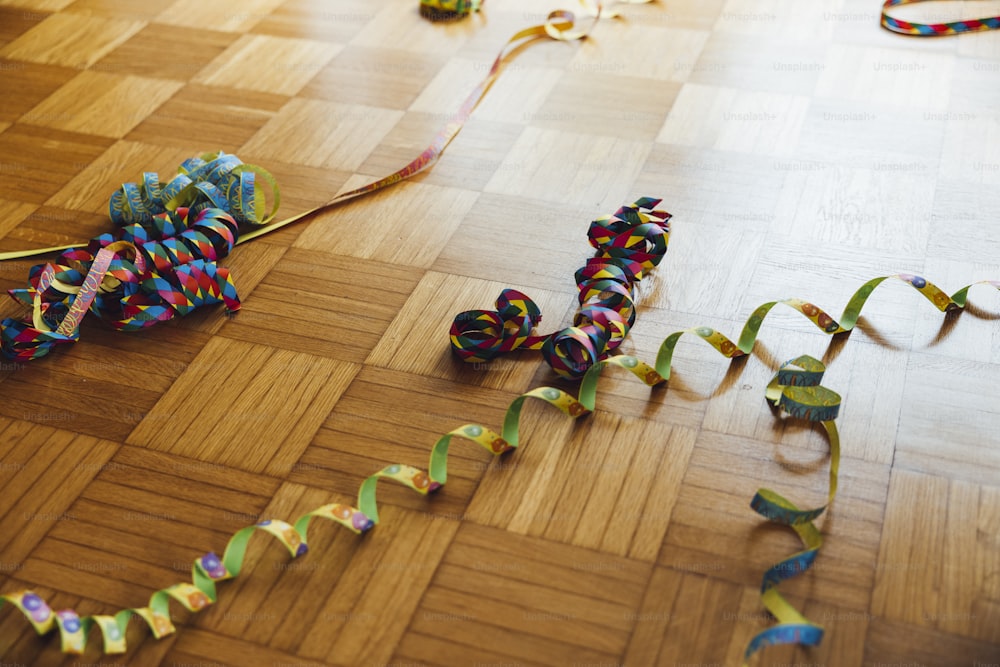 a group of ribbons on a wooden floor