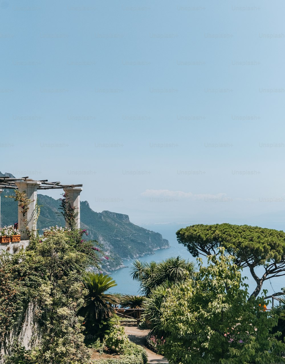 a view of the ocean from a hill top