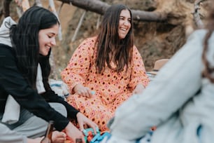 a group of women sitting next to each other