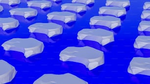 um grande grupo de icebergs que estão flutuando na água