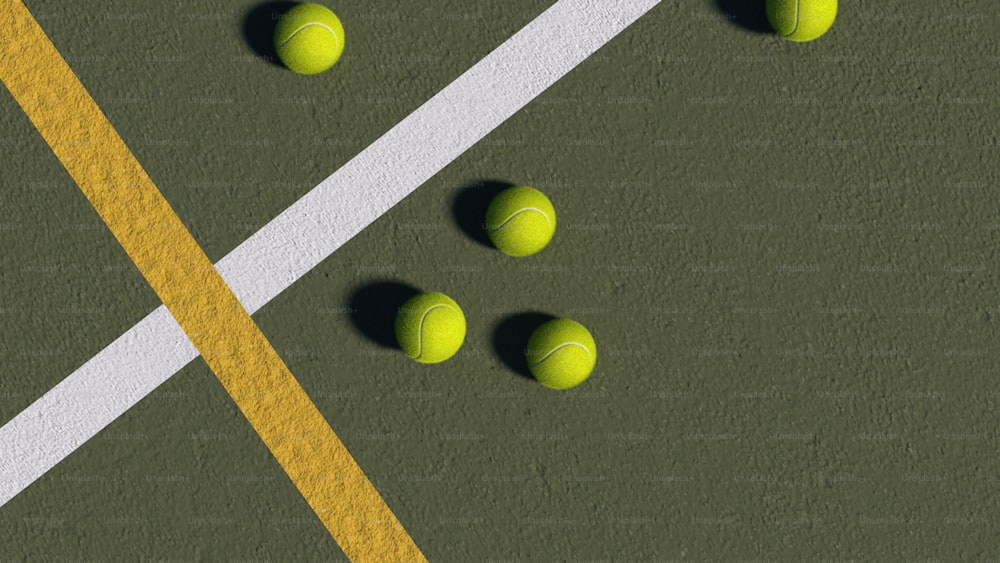 uma quadra de tênis com quatro bolas de tênis