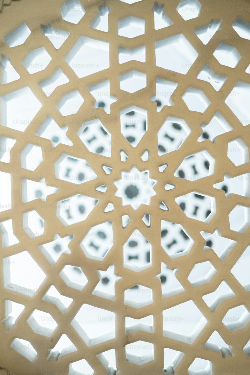 a close up of a window with a pattern on it