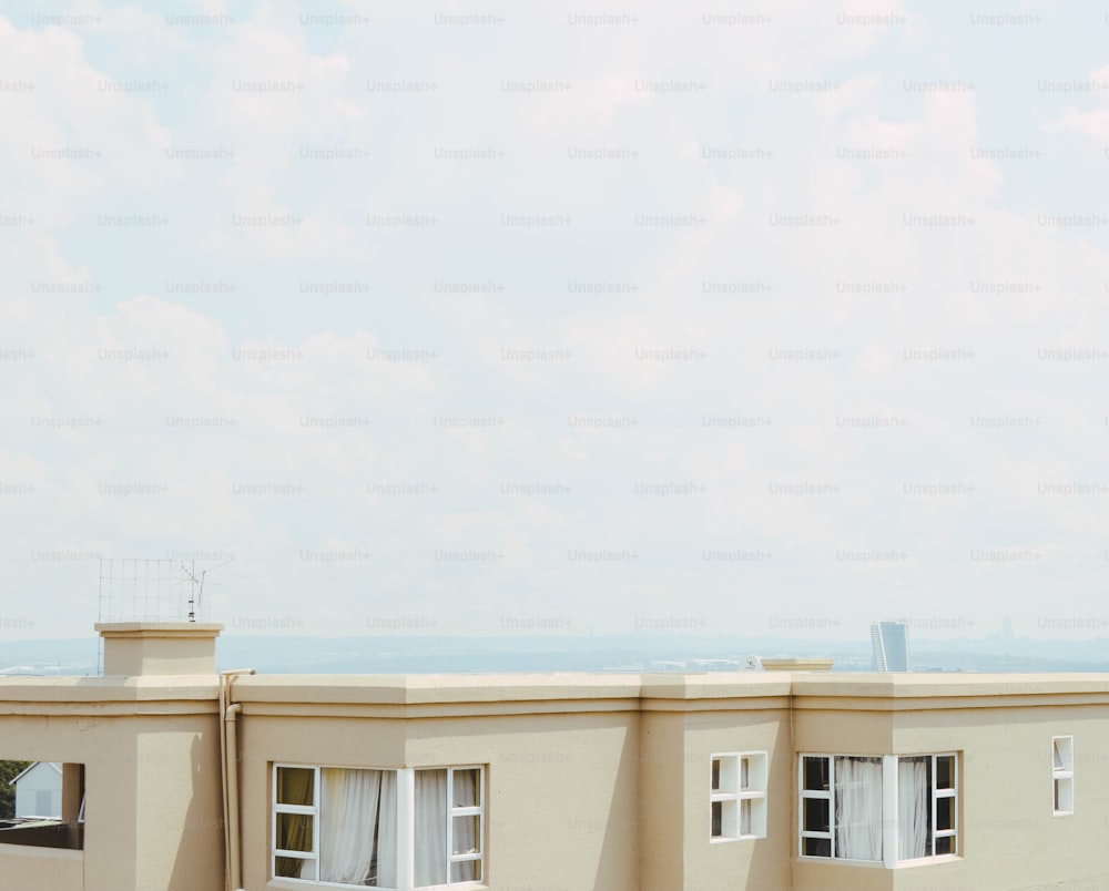 a view of a building with a view of the ocean