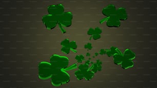 Eine Gruppe grüner Kleeblätter auf schwarzem Hintergrund