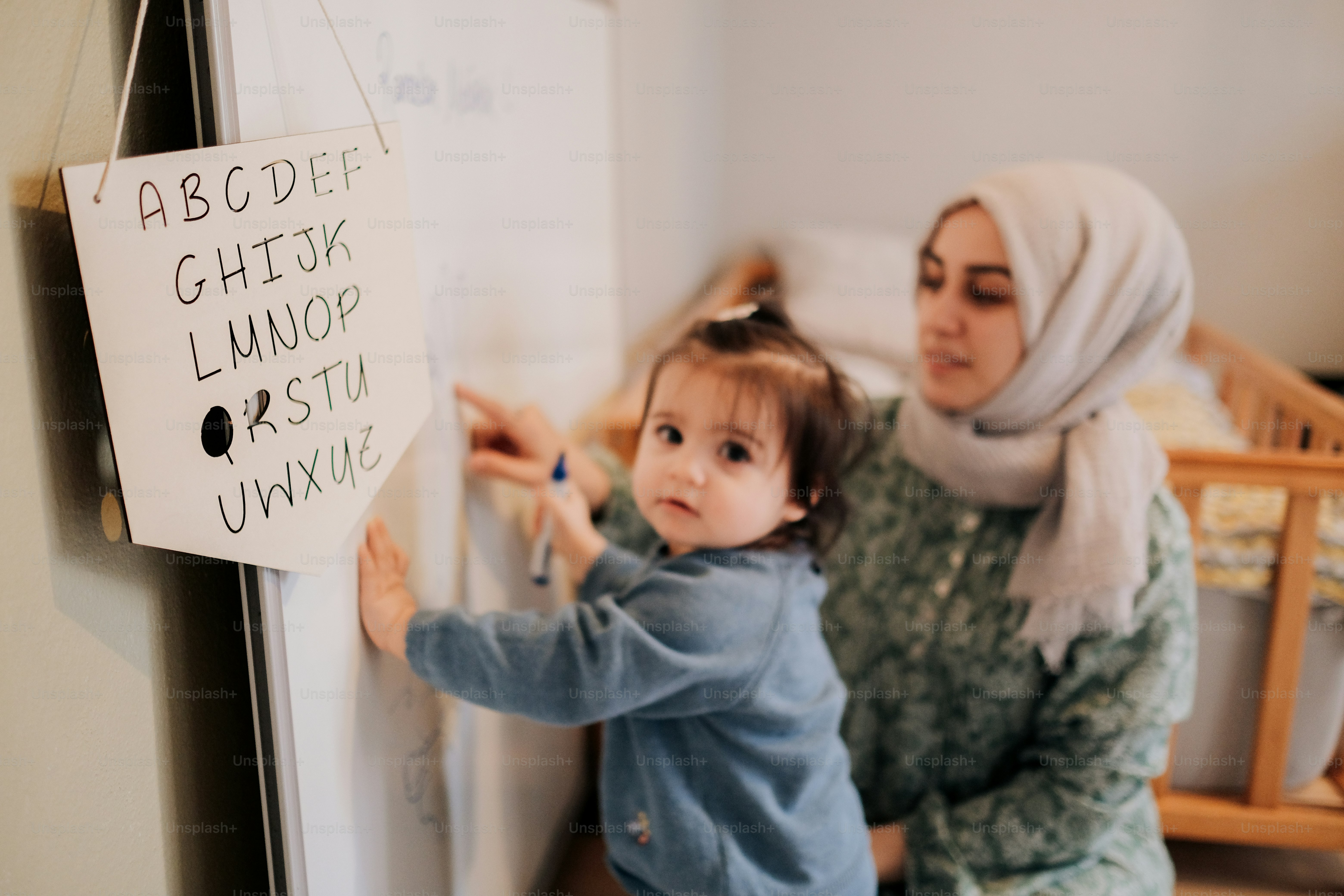 a woman and a child in a room