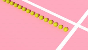 a pink background with a line of tennis balls