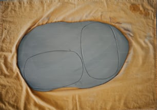 a drawing of two oval shapes on a sheet of paper