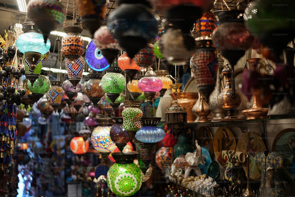 a store filled with lots of different colored vases