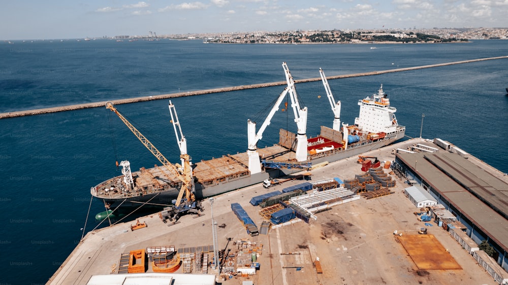 a large boat is docked in the water