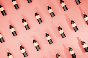 a group of bottles of wine on a pink background