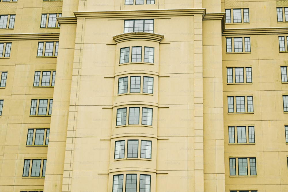 a large building with a clock on the front of it