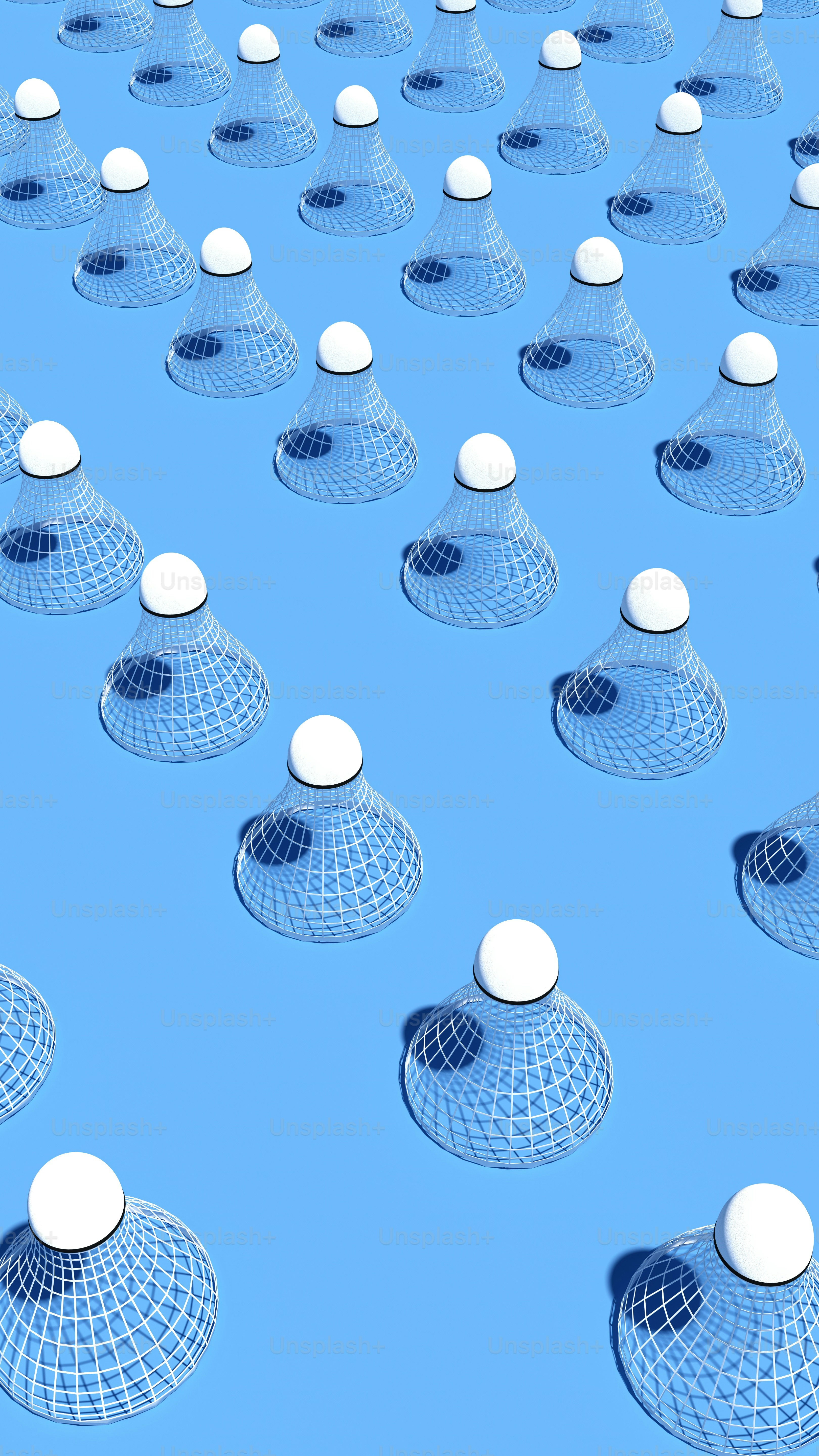 un grand groupe d’objets blancs sur une surface bleue