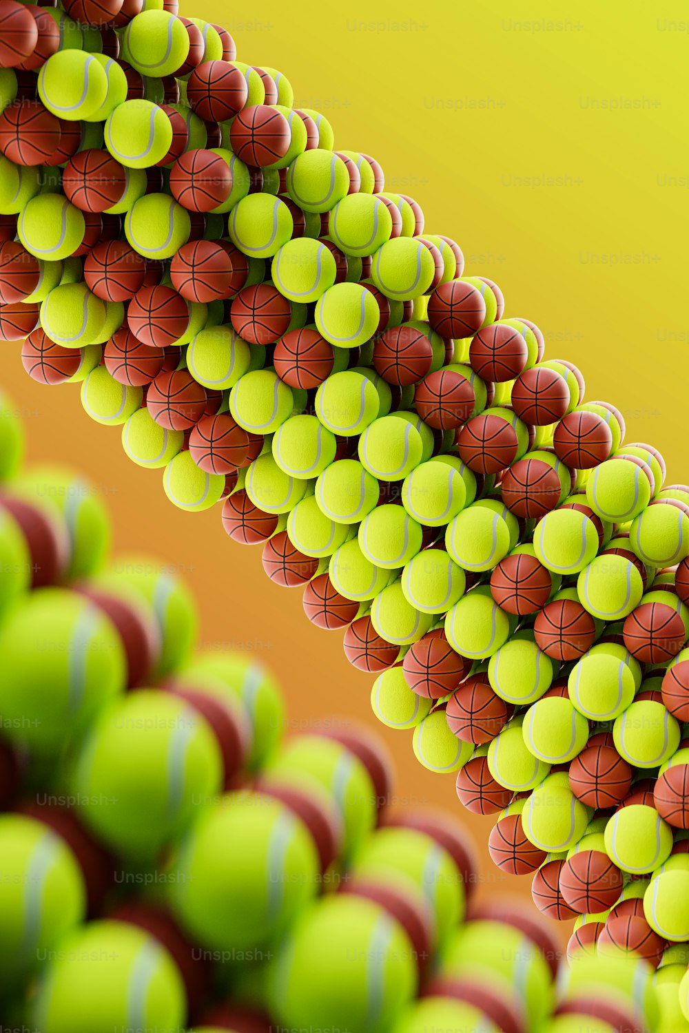 a bunch of tennis balls stacked on top of each other