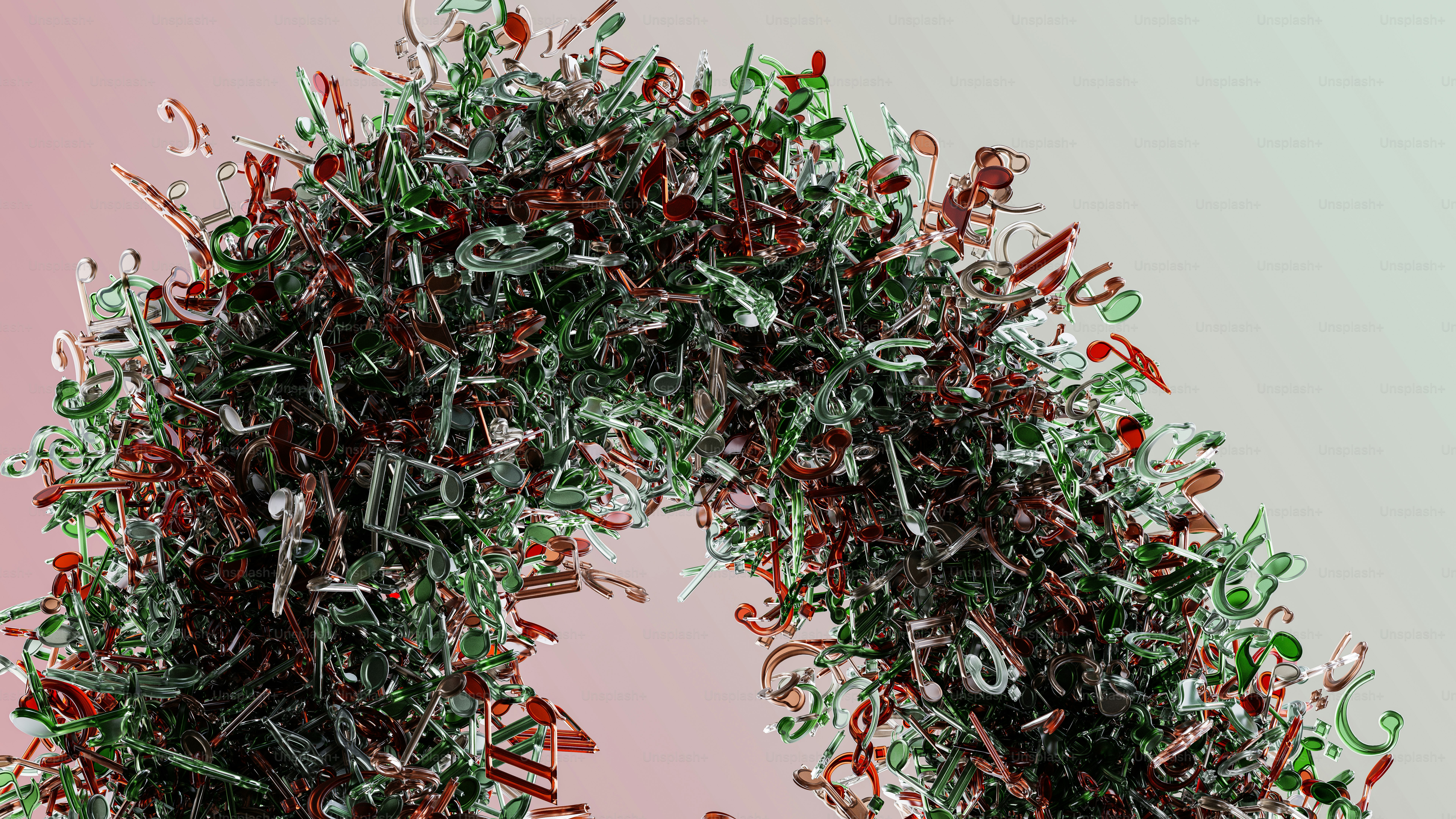 ein Haufen grünes, rotes und weißes Konfetti auf rosa Hintergrund