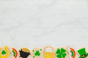 a number of decorated cookies on a table