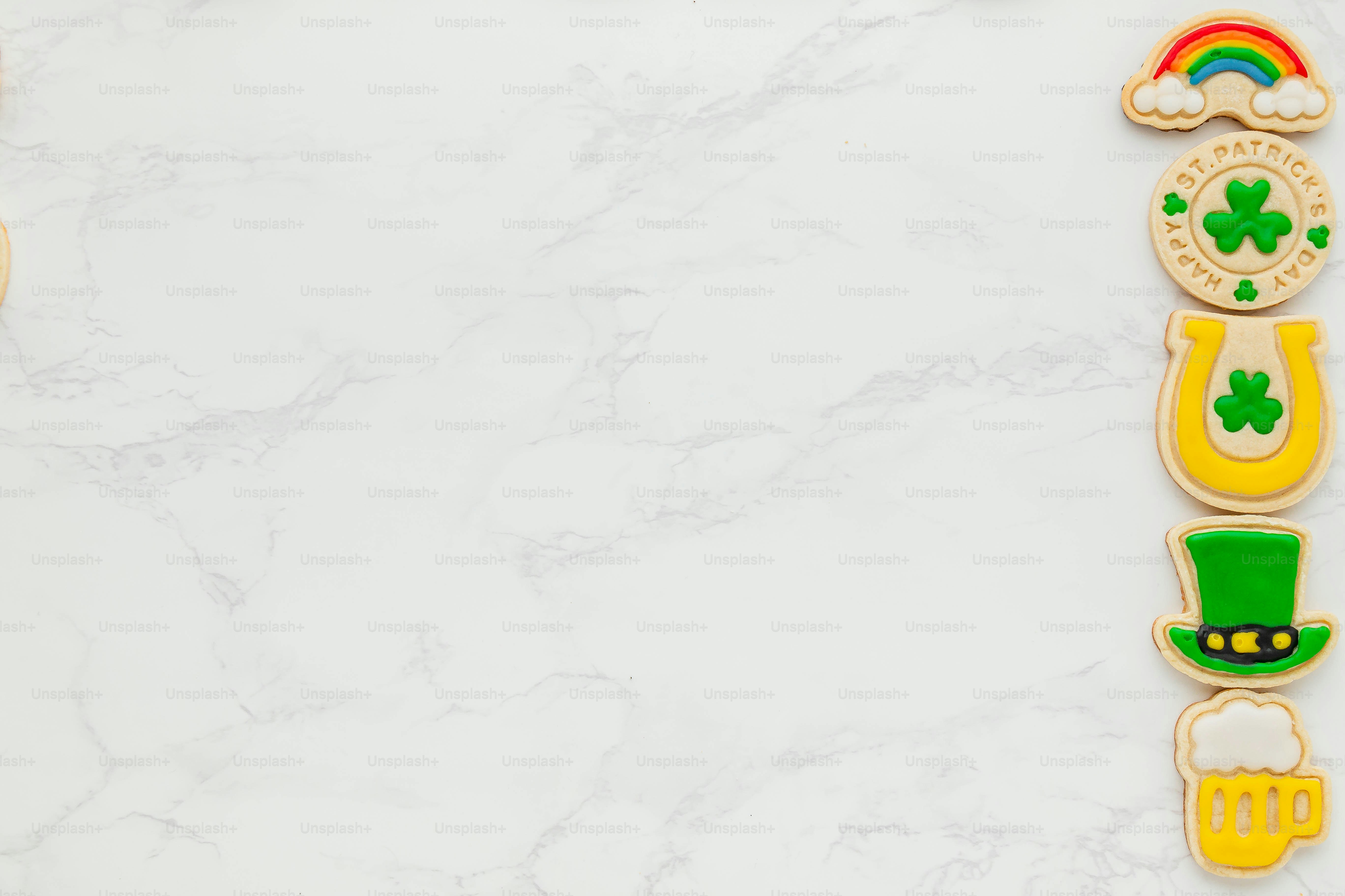 a white marble background with a st patrick's day cookie border