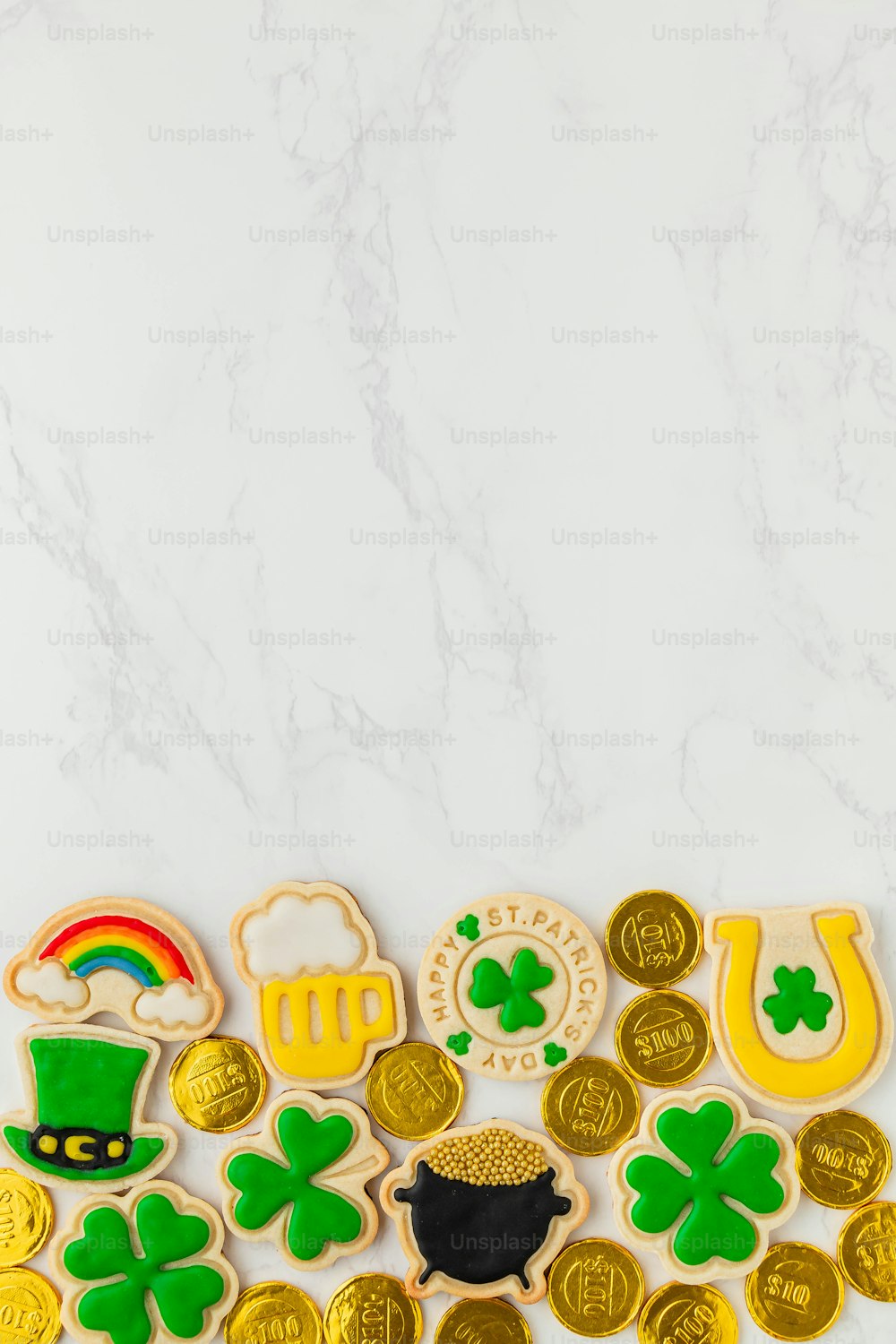 st patrick's day cookies with shamrocks and gold coins
