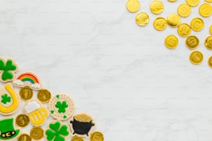 a table topped with lots of gold coins