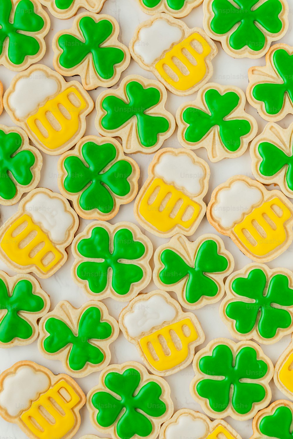 a close up of a plate of decorated cookies