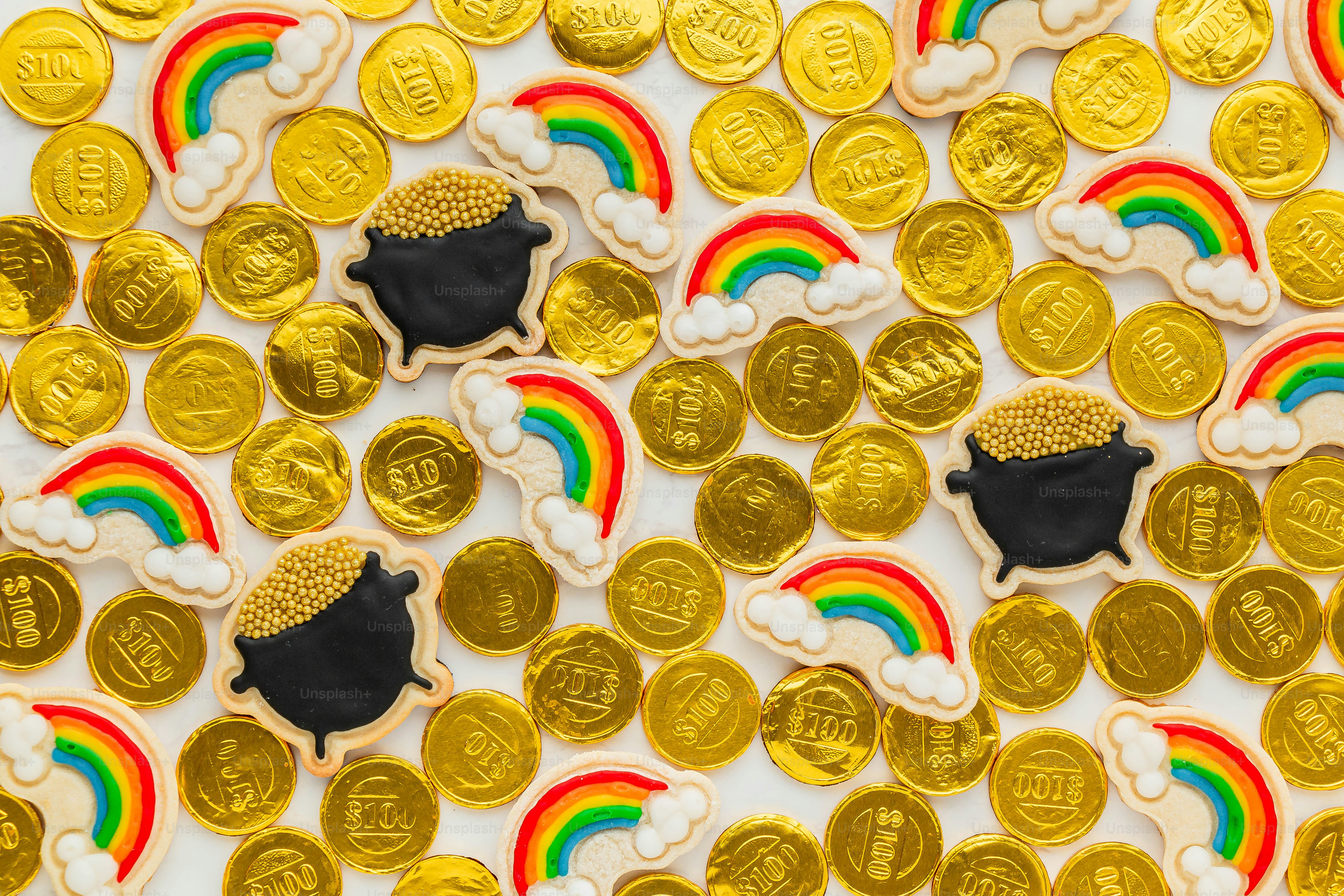 a table topped with lots of gold coins